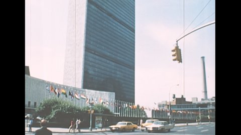 New York, Manhattan, United States America 1976: United Nations headquarters palace with flags of the world. Archival of United States of America in 1970s.