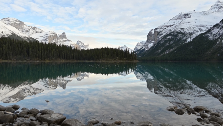 Scenery of Canadian Rockies reflection on Maligne lake near Spirit island at Jasper national park, Alberta, Canada