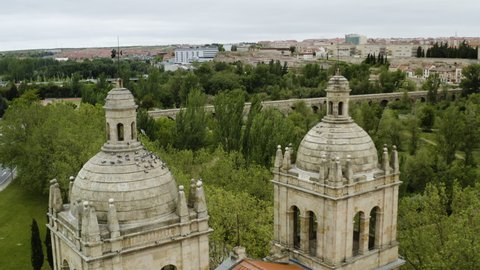 Spires Of The New Church Of Arrabal And The Roman Bridge In Salamanca City, Spain. aerial
