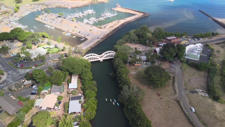 drone aerial panning view of the haleiwa bridge on oahu hawaii