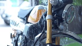 VIDEO Shot of Washing Classic Motorcycle