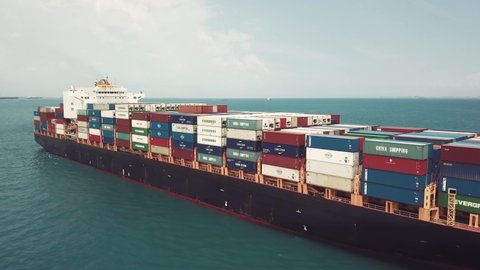 Drone shot of container ship sailing, Singapore Straits
