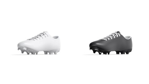 Blank black and white leather soccer boot mockup, looped rotation, 3d rendering. Empty training shoes for playing or running mock up, isolated, 4k video. Clear footwear with rubber sole template.