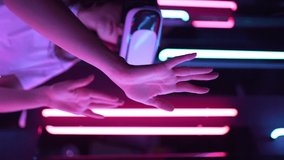 Vertical video. Immersive experience in cyberpunk and retrofuturism. Interacting with VR technology