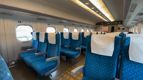 JAPAN - APRIL 2021 : View inside empty Bullet Train (Shinkansen). No people on train, due to concerns over Coronavirus (COVID-19), State of emergency. Tokyo - Osaka line.