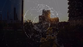 Animation of global network of connections rotating over city at sunset. global communication, digital interface and data network concept, digitally generated video.