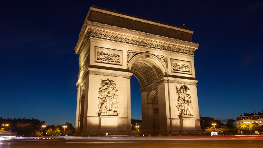 4K UHD night timelapse of the Triumphal Arch - Arc De Triomphe in Paris France Royalty-Free Stock Footage #1076374160