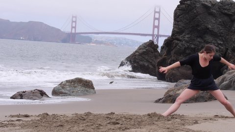 Woman Dances Alone on the Beach, Foggy Day, Passion and Expression