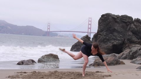 Intense, Dramatic Interpretive Dancing on the Sandy Beach, Golden Gate Bridge, Wide