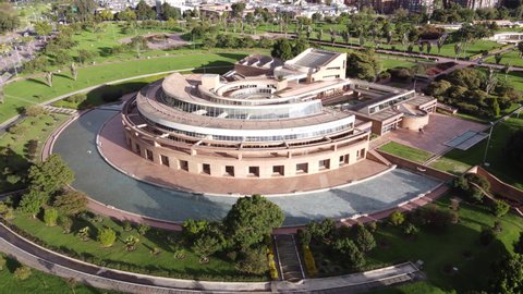 Aerial video of the Virgilio Barco Library and in the background the wide park to rest. It is close to the Simon Bolivar Park and the Children's Park.