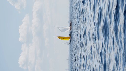 Russia, St.Petersburg, 20 June 2021: Regatta of sail boats at sunny day, boats run different tack, teams are preparing to put gennaker, the clear sky, sailing, reflection of sail on the water