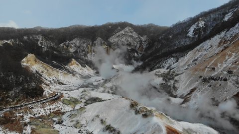 Japan Hell Valley Onsen Hot Spring Aerial View With Snowing