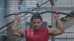 Animation of network of connections and data processing over fit man exercising in gym. global sports, fitness, data processing and digital interface concept digitally generated video.