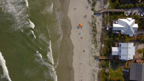 Aerial of Folly Beach in South Carolina as the sunsets from above