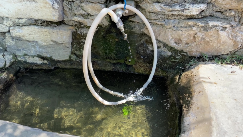 An Ancient Fountain with White Architecture