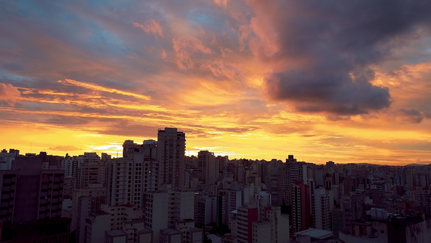 Sao Paulo, Brazil. Sunset aerial view at downtown city of Sao Paulo, Brazil. Colorful sky. Colorful clouds. Sunset at downtown city. Buildings background. Skyscrapers background. Sao Paulo sunset view