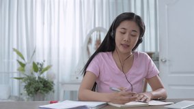 Education concept of 4k Resolution. Asian girls are communicating using a computer.