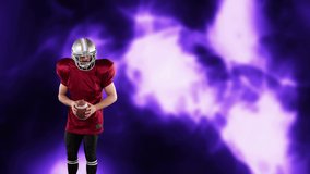 American football player holding ball over light trails. global sports, fitness, science and data processing concept digitally generated video.