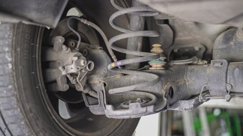 Detail of Rigid axle car shock absorbers