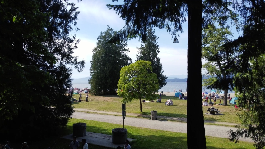 Vancouver beack on a sunny day with people relaxing