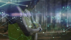 Animation of network of connections over woman exercising in forest. global connections, fitness, wellbeing concept digitally generated video.