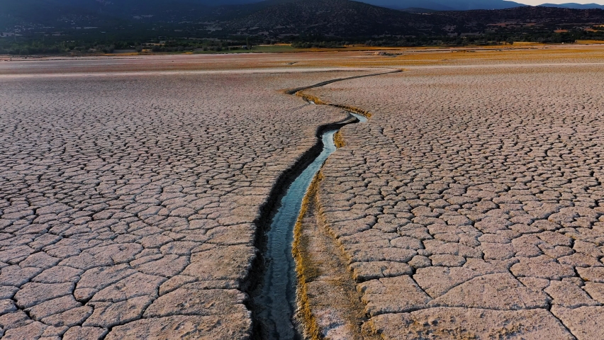 cracked soil and curved river as water sources laake burdur view Royalty-Free Stock Footage #1076436704
