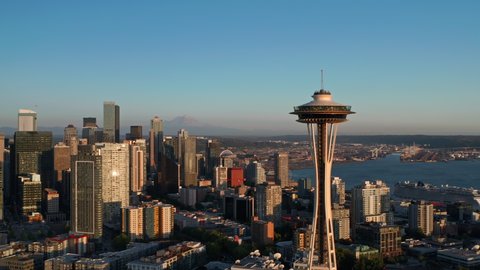 Seattle, WA  USA - July 18, 2021: Seattle city view featuring Space Needle, MT Rainier and Elliott Bay