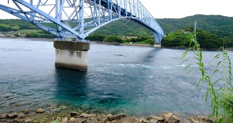 The sea swirling under the Kuronosetoo Bridge