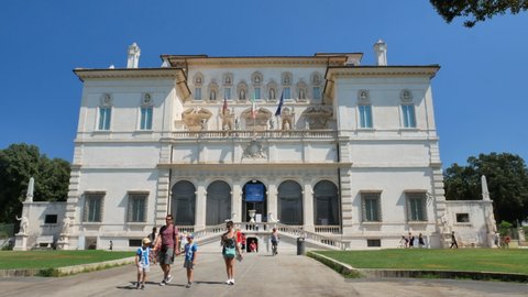 ROME - AUGUST 22, 2019: People walk in front of Villa Borghese Pinciana building in Rome - 4K, Handheld, Editorial