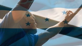 Animation of flag of honduras over strong muscular man doing pull ups. global sports, fitness and exercise concept digitally generated video.