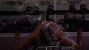 Animation of dna strand spinning over fit man exercising with weights. global sports, fitness, science and data processing concept digitally generated video.