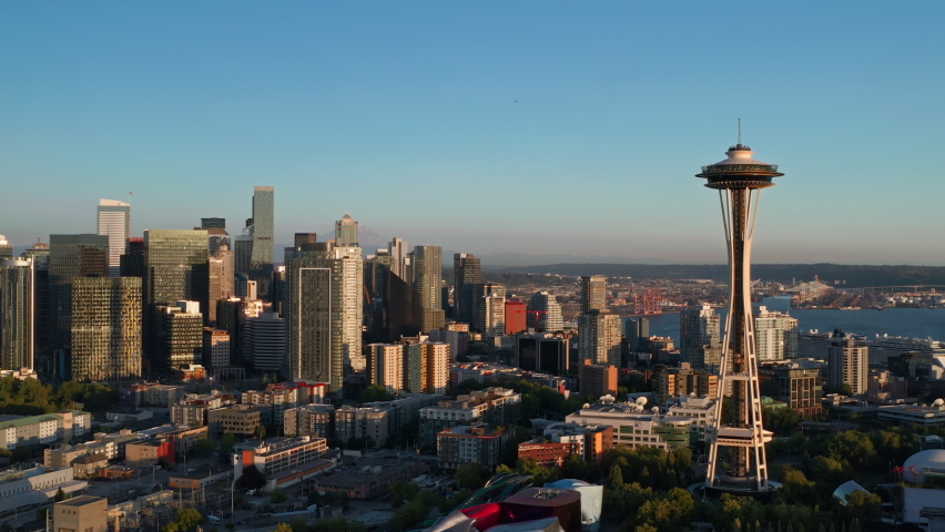 Seattle, WA  USA - July 18, 2021: Seattle city view at sunset featuring Space Needle, MT Rainer and cruise ship on Elliott bay