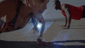 Animation of digital interface over couple doing push-ups outdoors. global sports, fitness, data processing and digital interface concept digitally generated video.