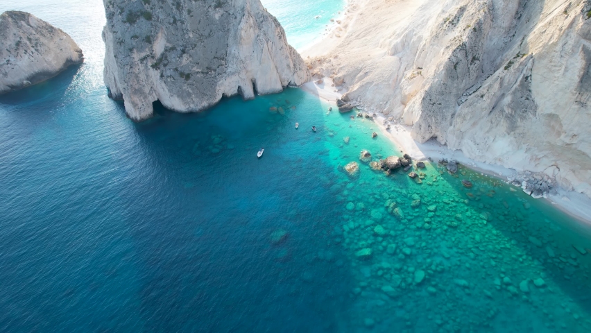 Aerial view of the famous Mizithres rocks and beaches on the south coast of Zakynthos island, Greece, during sunset time