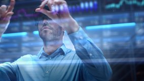 Young Adult Male Engineer Using Futuristic Augmented Reality Software Interface for Managing Work Projects. Specialist in Office Wearing Headset to Look at VFX Animation with Electric Car Concept. - Powered by Shutterstock - Get 15% off with code: PIKWIZARD15