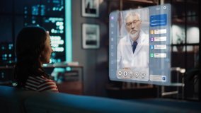 Woman Using Augmented Reality Software At Home, Sitting on Couch in Living Room, Making Gestures to Answer AR Video Call Chat with Family Doctor. Medical Health Online Examination and Doctor Visit.