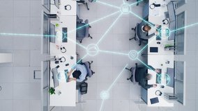 Top Down Footage of a Busy Corporate Office with Tow Rows off Businessmen and Businesswomen Working on Desktop Computers. VFX Animation of Connected Technological Social Network Between Colleagues. - Powered by Shutterstock - Get 15% off with code: PIKWIZARD15