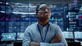 First Person POV Footage of Professional IT Technical Support Specialist or Software Engineer Pushing Augmented Reality Display in a Modern Monitoring Control Room Full of Computers. VFX Animation. - Powered by Shutterstock - Get 15% off with code: PIKWIZARD15