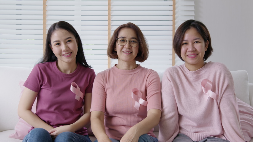 Diversity group asia happy people or senior mature lady and teen girl sit at home sofa smile look at camera to help fight prevent or protect female disease issue relief, patient health care benefit. Royalty-Free Stock Footage #1076505812
