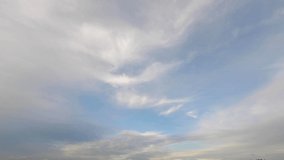 blue pastel sky. timelapse of transparent clouds in atmosphere. aerial view of heavenly sky. soft blue nature background. good air in summer season. environment high in sky. cloudy day cloudscape VDO