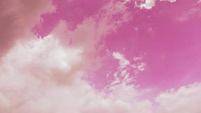 colorful abstract clouds sky. pink, orange fluffy clouds in cloudy weather. beautiful sweet pastel clouds in the atmosphere. timelapse cloudscape nature background. color of clouds high in sky