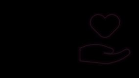Glowing neon line Heart in hand icon isolated on black background. Hand giving love symbol. Valentines day symbol. 4K Video motion graphic animation.