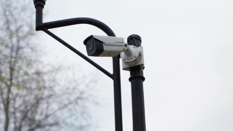 CCTV camera on a black park pole. remote security surveillance system. video security surveillance in public and private area. control of order by security authorities. May 3, 2021, Kyiv, Ukraine
