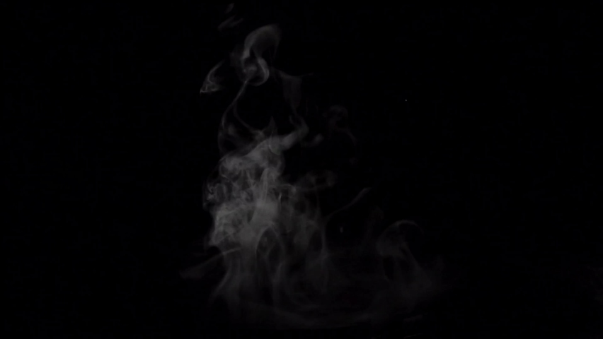 Smoke for food and drink, Soft Fog in Slow Motion on Dark Backdrop. Realistic Atmospheric Gray Smoke on Black Background. White Fume Slowly Floating Rises Up. 120fps. | Shutterstock HD Video #1076534216