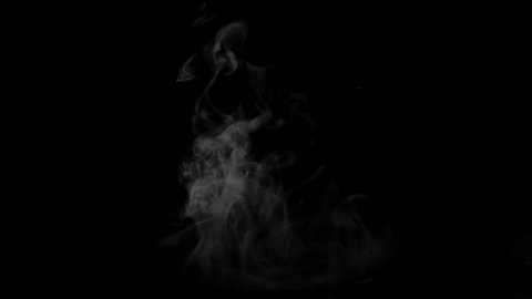 Smoke for food and drink, Soft Fog in Slow Motion on Dark Backdrop. Realistic Atmospheric Gray Smoke on Black Background. White Fume Slowly Floating Rises Up. 120fps.