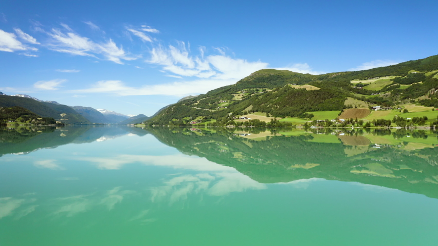 Vagavatn Lake - Panorama Of Vaga Lake With Mountain Views At Daytime In Norway. - aerial wide