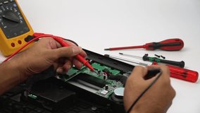 Close-up view of male engineer testing circuit board. - Powered by Shutterstock - Get 15% off with code: PIKWIZARD15