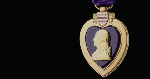 CALIFORNIA, UNITED STATES – July 26, 2021: Stock footage of father’s purple heart medal for military merit that he earned in Vietnam in 1969.