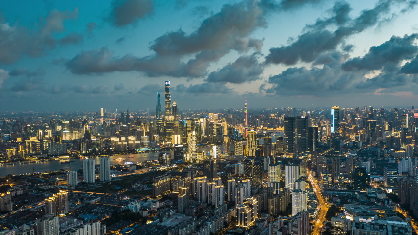 Drone shot: 4K Aerial view of Shanghai skyline in sunny sky，Night scene. Shoot with Cinema DNG sequence