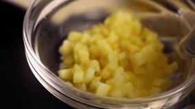 Fry cut potatoes with onions in a pan. 4k video